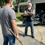 I brought a baseball bat to confront the biker who’d been harassing my daughter. I left his driveway twenty minutes later crying so hard I couldn’t drive.